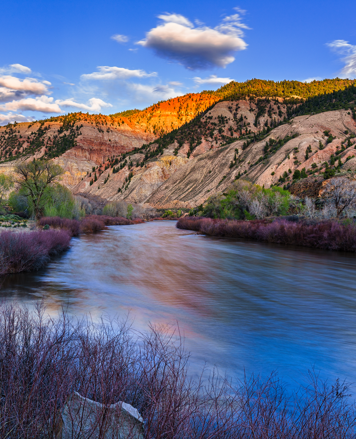 River flowing through scenic mountain landscape